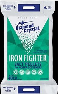 Green and white bag of salt pellets